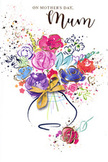 This Mother's Day card features a lively, watercolour bouquet that seems to bloom off the page, echoing the energy of Shadwell's streets on a spring afternoon. At its heart, plump cerise and bright magenta flowers cluster together, their curved petals outlined in rich indigo strokes that bring clarity to the otherwise free-flowing paint. Around them, softer mists of lavender, powdery blue, and warm apricot radiate outward, blending at their edges where the colours meet and run, like reflections blurring on the surface of the nearby Thames. Subtle gold detailing traces selected petals and hints of foliage, adding a touch of sparkle that recalls the glimmer of evening light on the river or metal railings by the station. The bouquet is held in a simply indicated vase-a rounded form painted in light neutral tones-finished with a slim golden bow, reminiscent of the careful way florists at Flowers Shadwell tie ribbon around a finished arrangement. Scattered hearts, splatters, and droplets of paint float around the bouquet, softening the white background and suggesting movement, celebration, and the affectionate untidiness of a home where Mother's Day breakfast is being prepared. The image is both joyful and soothing, with each colour playing off the others in a harmonious mix of pinks, purples, blues, and greens. It feels intentionally emotional, like a visual whisper of thank you and I love you, perfectly suited to sit alongside a fresh bouquet being delivered through Shadwell's riverside paths, narrow streets, and bustling corners, capturing the essence of appreciation in every expressive brushstroke.